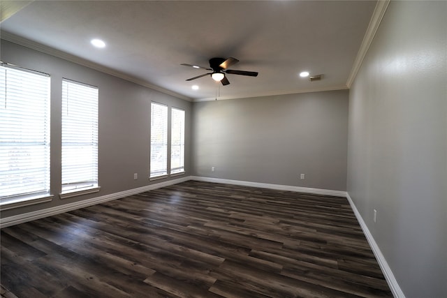 empty room with crown molding, ceiling fan, and dark wood-type flooring