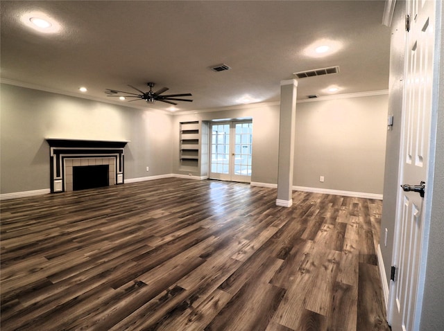 2304 Eagles Way, Pearland, TX 77581 - unfurnished living room with ornamental molding, ceiling fan, dark wood-style floors, baseboards, and french doors
