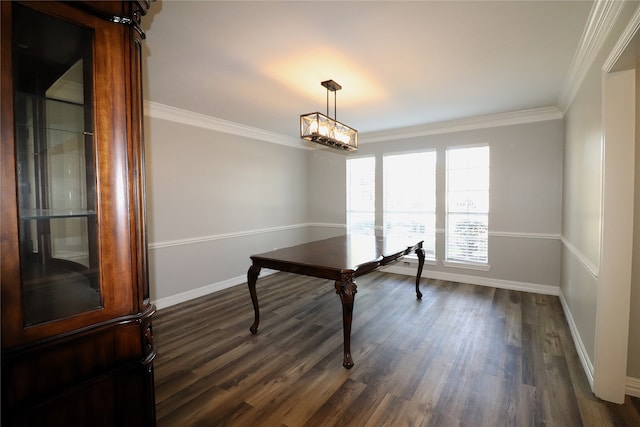 office area featuring dark hardwood / wood-style floors, ornamental molding, and a chandelier