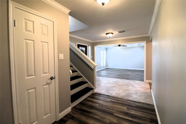 2304 Eagles Way, Pearland, TX 77581 - corridor with ornamental molding, dark wood-type flooring, stairway, and baseboards
