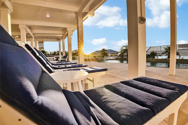 view of patio / terrace featuring a water view