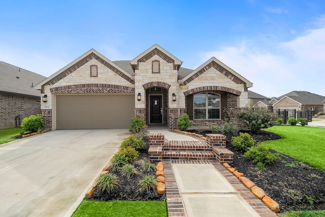 french country home with a garage and a front yard