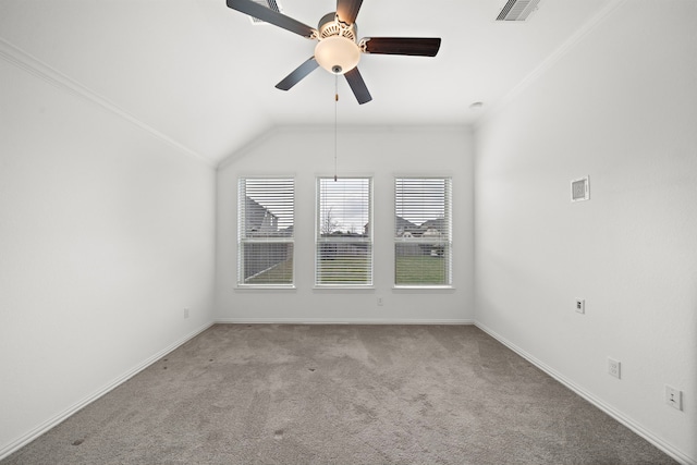 additional living space with ceiling fan, light colored carpet, and lofted ceiling