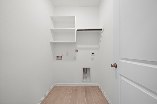 laundry room with electric dryer hookup, hookup for a gas dryer, and hookup for a washing machine