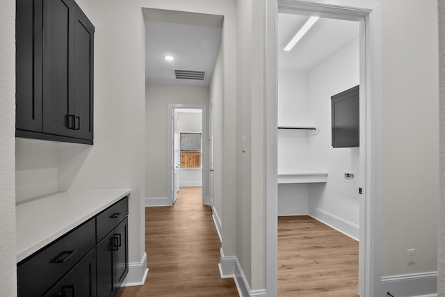 hall featuring light hardwood / wood-style flooring