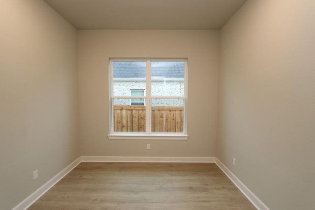 empty room featuring light hardwood / wood-style floors