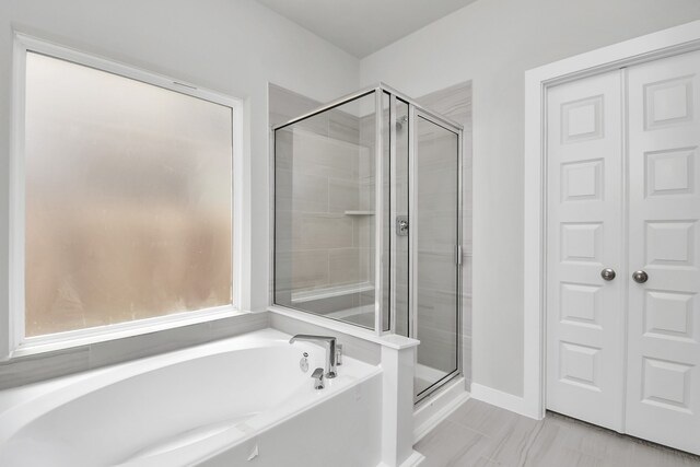 bathroom with plus walk in shower