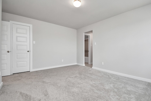 unfurnished room featuring carpet floors