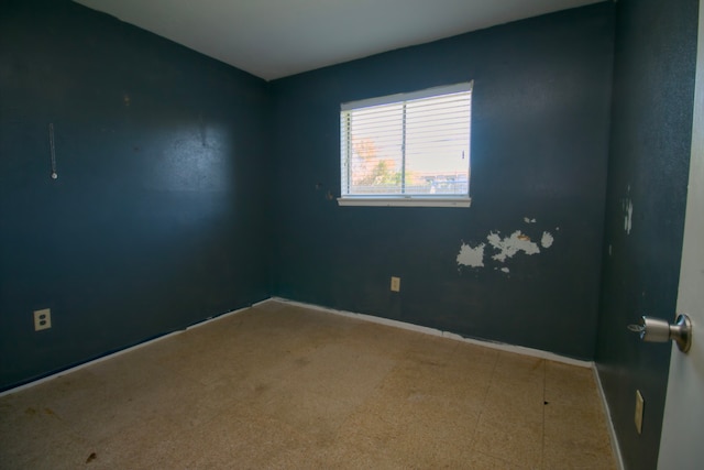 spare room featuring carpet flooring