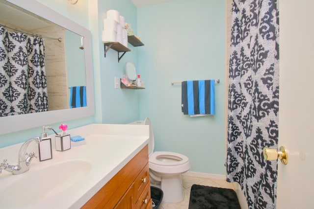 bathroom with tile patterned floors, vanity, a shower with shower curtain, and toilet