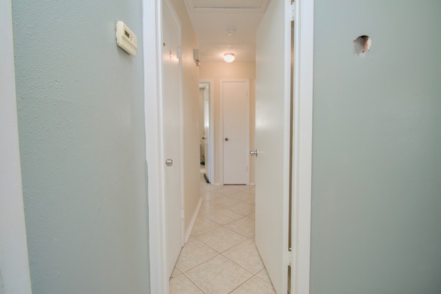 hallway with light tile patterned floors