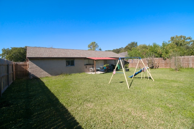 view of yard with a playground