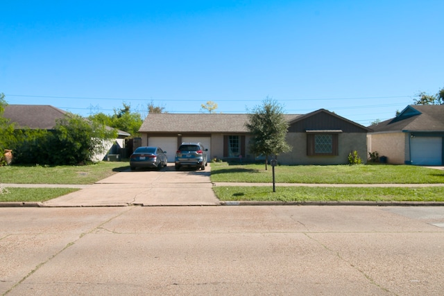 single story home with a garage and a front yard