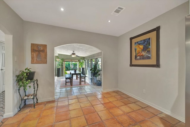 corridor featuring light tile patterned flooring