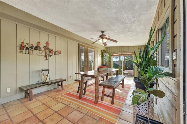 sunroom / solarium with ceiling fan