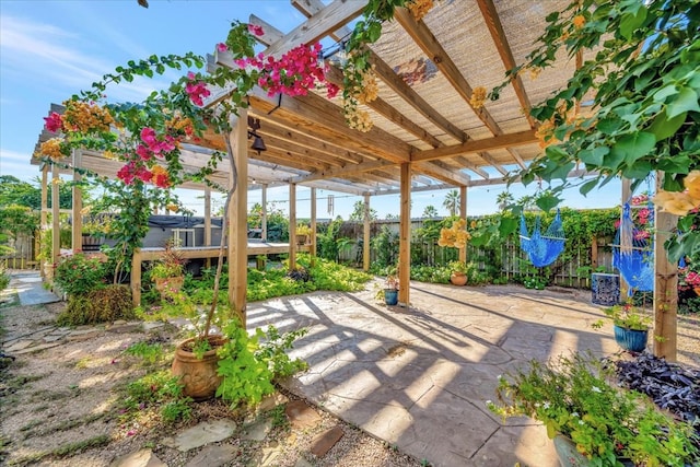 view of patio / terrace featuring a hot tub