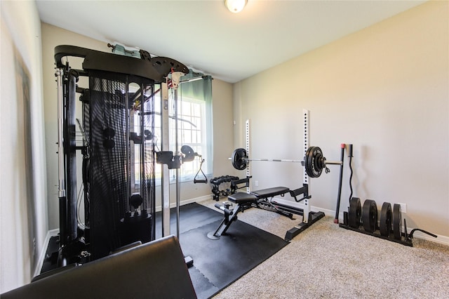 exercise room with carpet flooring