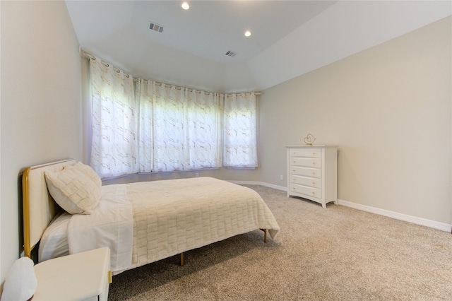 bedroom featuring carpet flooring and lofted ceiling