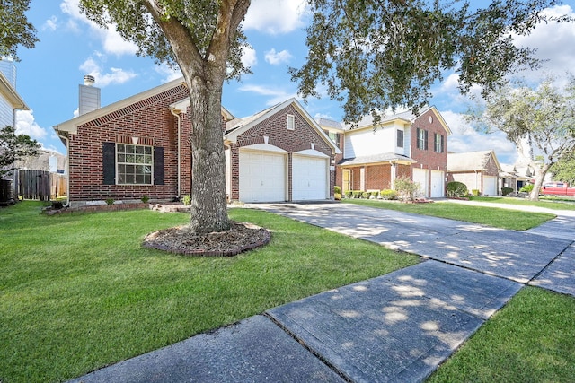 view of front of property with central AC unit, a front yard, and a garage