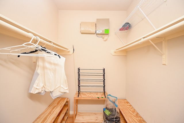 spacious closet featuring hardwood / wood-style floors