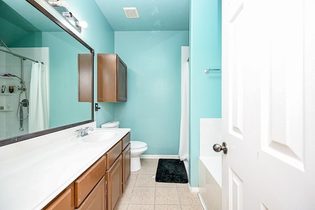 bathroom with curtained shower, tile patterned flooring, vanity, and toilet