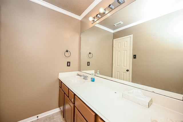 bathroom with vanity and crown molding