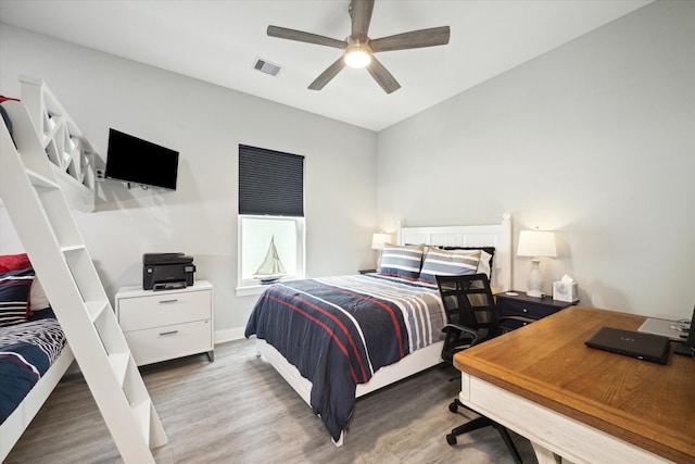 bedroom featuring wood-type flooring and ceiling fan