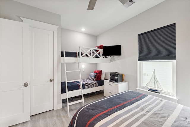 bedroom featuring ceiling fan and light hardwood / wood-style flooring