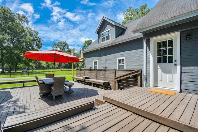 deck featuring a yard