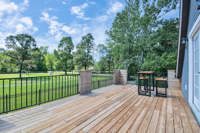 deck featuring a yard