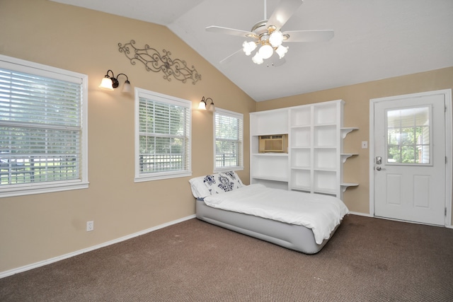 bedroom with ceiling fan, carpet, and vaulted ceiling