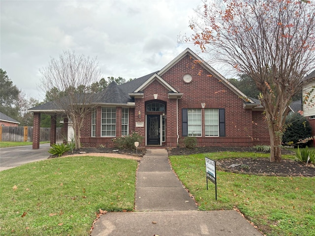 view of front of home with a front lawn