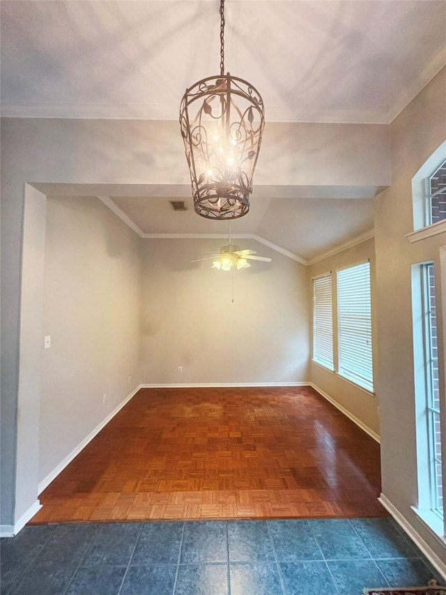 interior space featuring plenty of natural light, dark parquet flooring, ceiling fan with notable chandelier, and vaulted ceiling