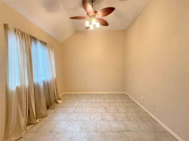 unfurnished room featuring ceiling fan and lofted ceiling