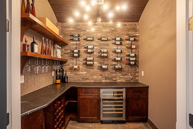 wine cellar featuring wooden ceiling, wine cooler, lofted ceiling, bar, and light tile patterned floors