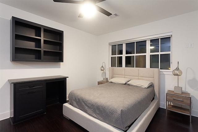 bedroom featuring dark hardwood / wood-style floors and ceiling fan