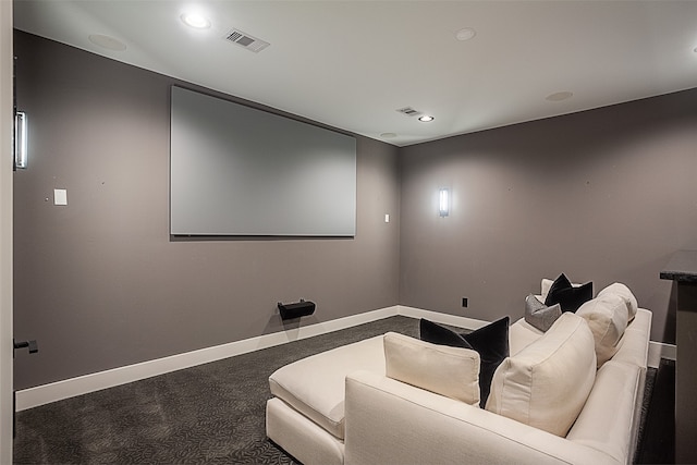 home theater with dark carpet