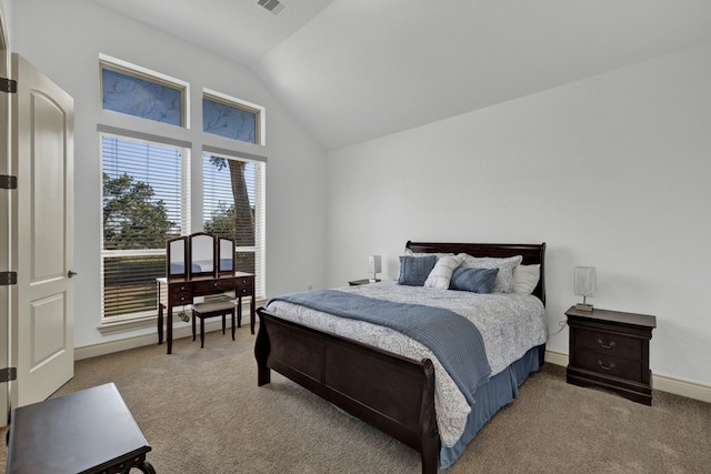 bedroom featuring carpet and lofted ceiling