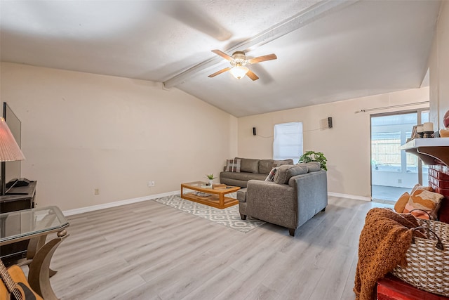 living room featuring light wood-type flooring, lofted ceiling with beams, and ceiling fan