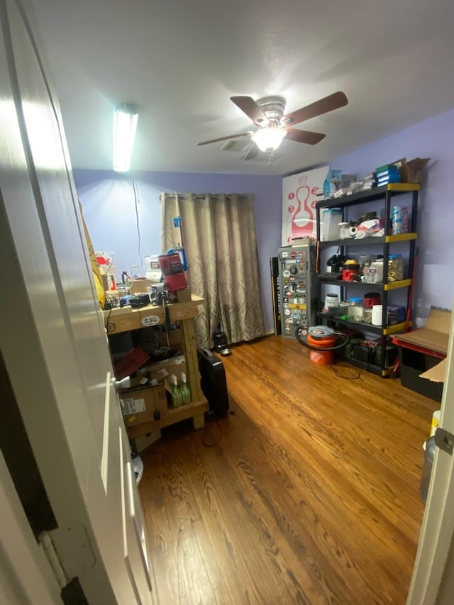 office featuring ceiling fan and hardwood / wood-style flooring