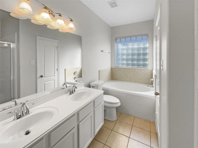 full bathroom featuring tile patterned floors, vanity, plus walk in shower, and toilet