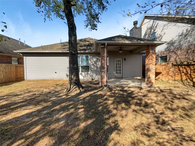 rear view of house with a patio area and ceiling fan