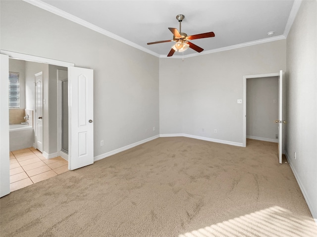 unfurnished bedroom featuring light carpet, ensuite bathroom, ceiling fan, and ornamental molding