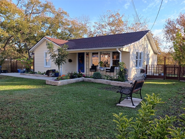 single story home with a front yard