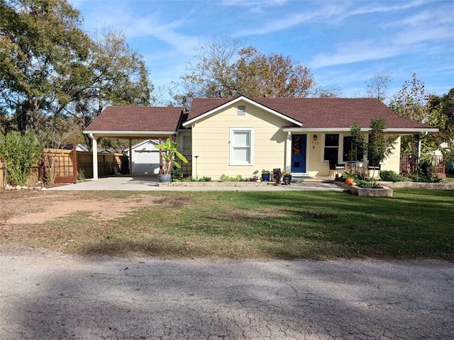 single story home with covered porch and a front lawn