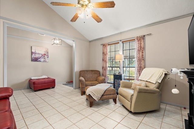 sitting room featuring ceiling fan, light tile patterned floors, and vaulted ceiling