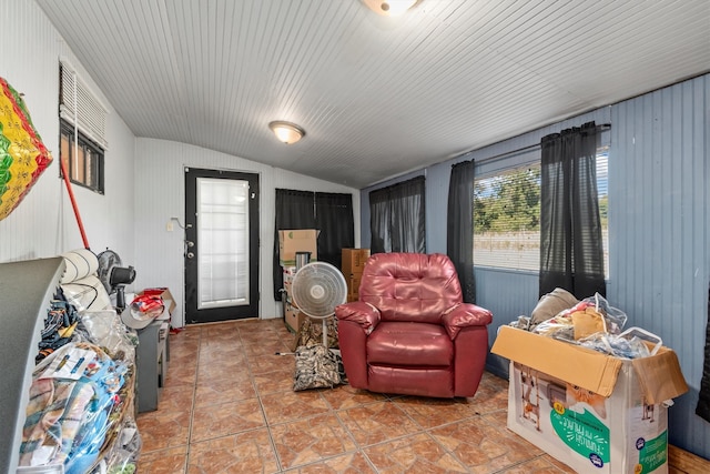 sitting room featuring vaulted ceiling