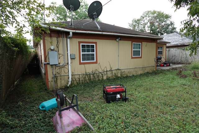 view of home's exterior featuring a yard