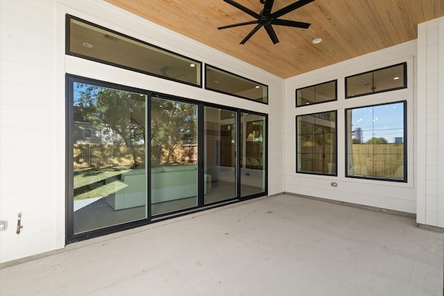 view of patio featuring ceiling fan