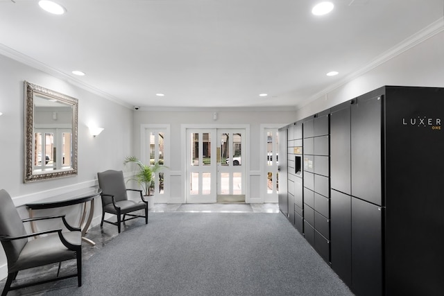 interior space featuring french doors, carpet, a package area, and ornamental molding